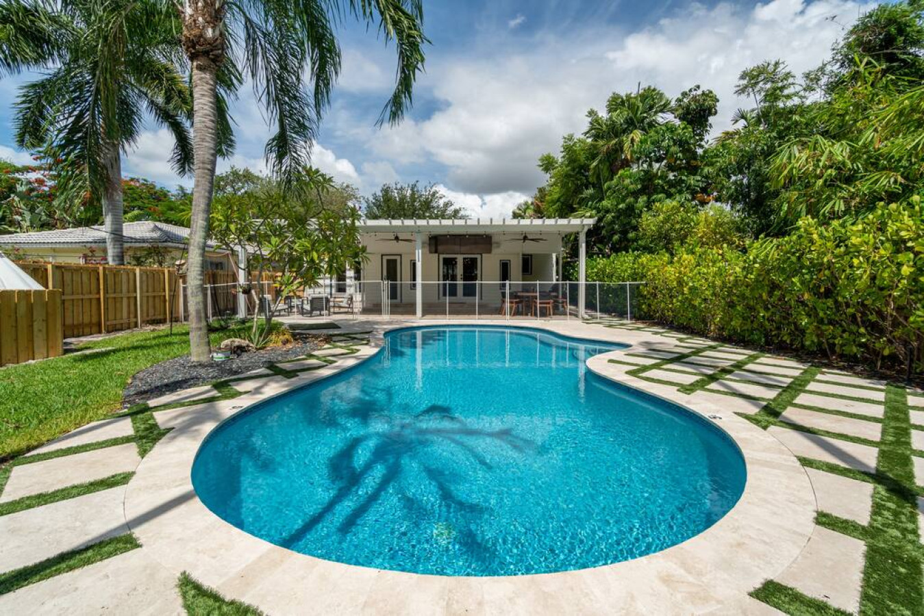 Warning: Entering this pool may lead to an unhealthy obsession with floaties, impromptu dance parties, and chasing away Monday blues.