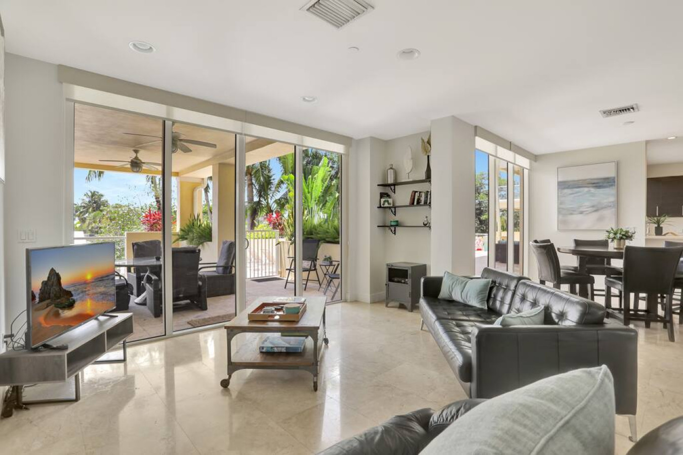 "Modern masterpiece with a touch of warmth. This living room is pure perfection."