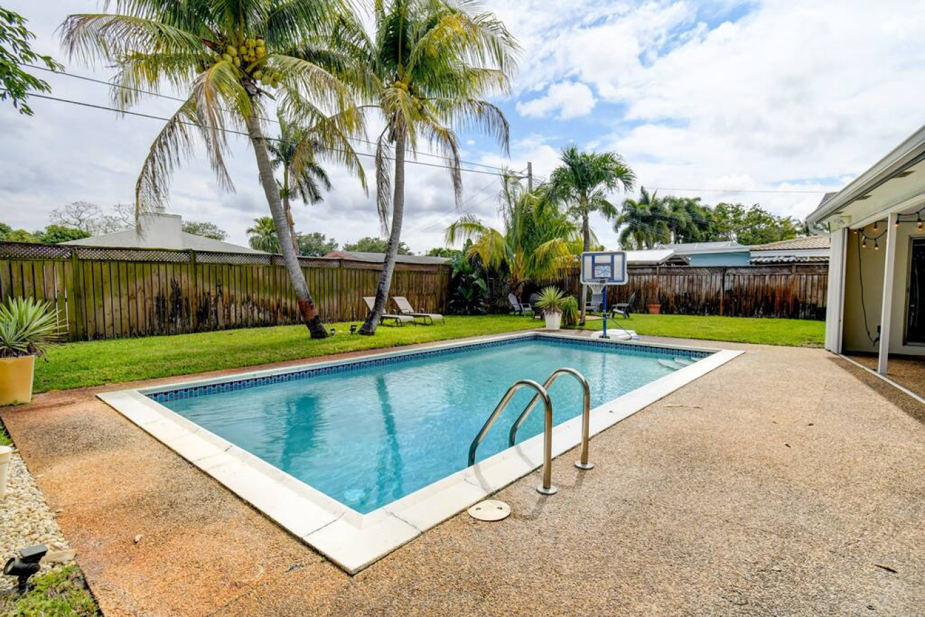 tranquil-oasis:-pool-and-fire-pit-in-boynton/