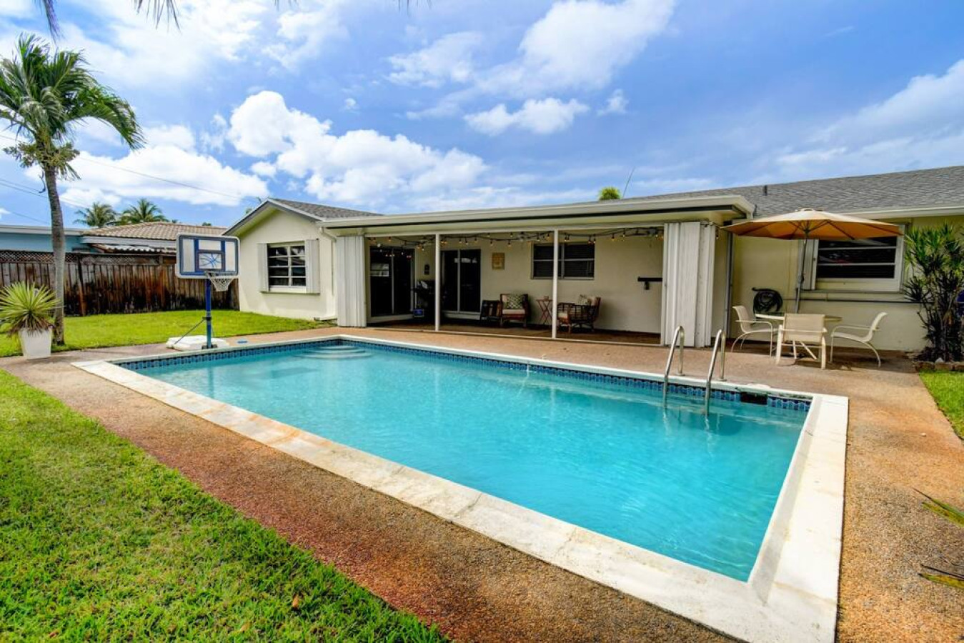 tranquil-oasis:-pool-and-fire-pit-in-boynton/