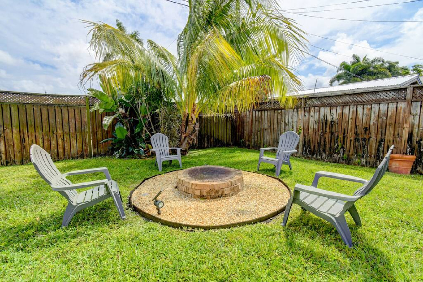 tranquil-oasis:-pool-and-fire-pit-in-boynton/