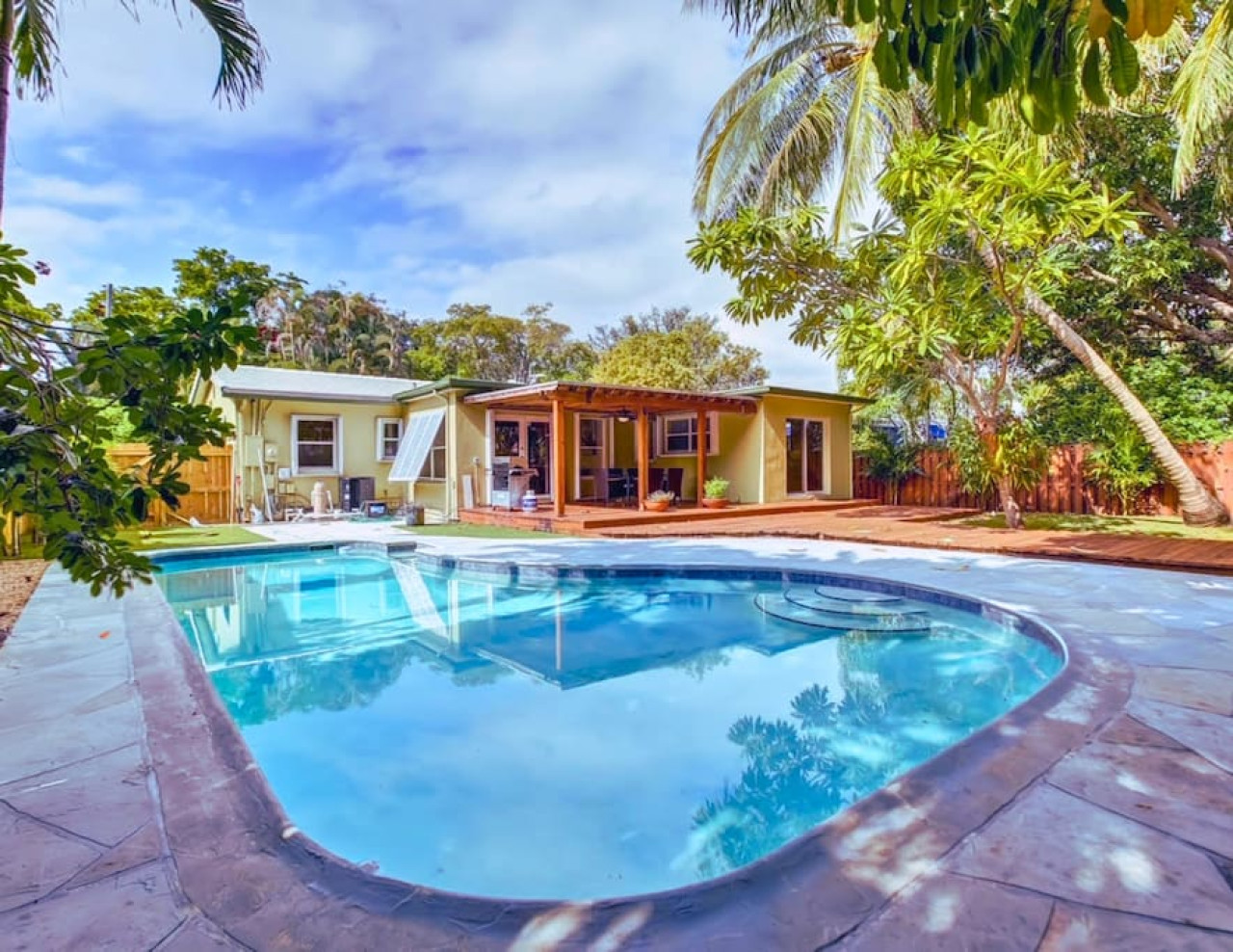 tranquil-poolside-bliss-+-pergola-deck-and-turf-yard/