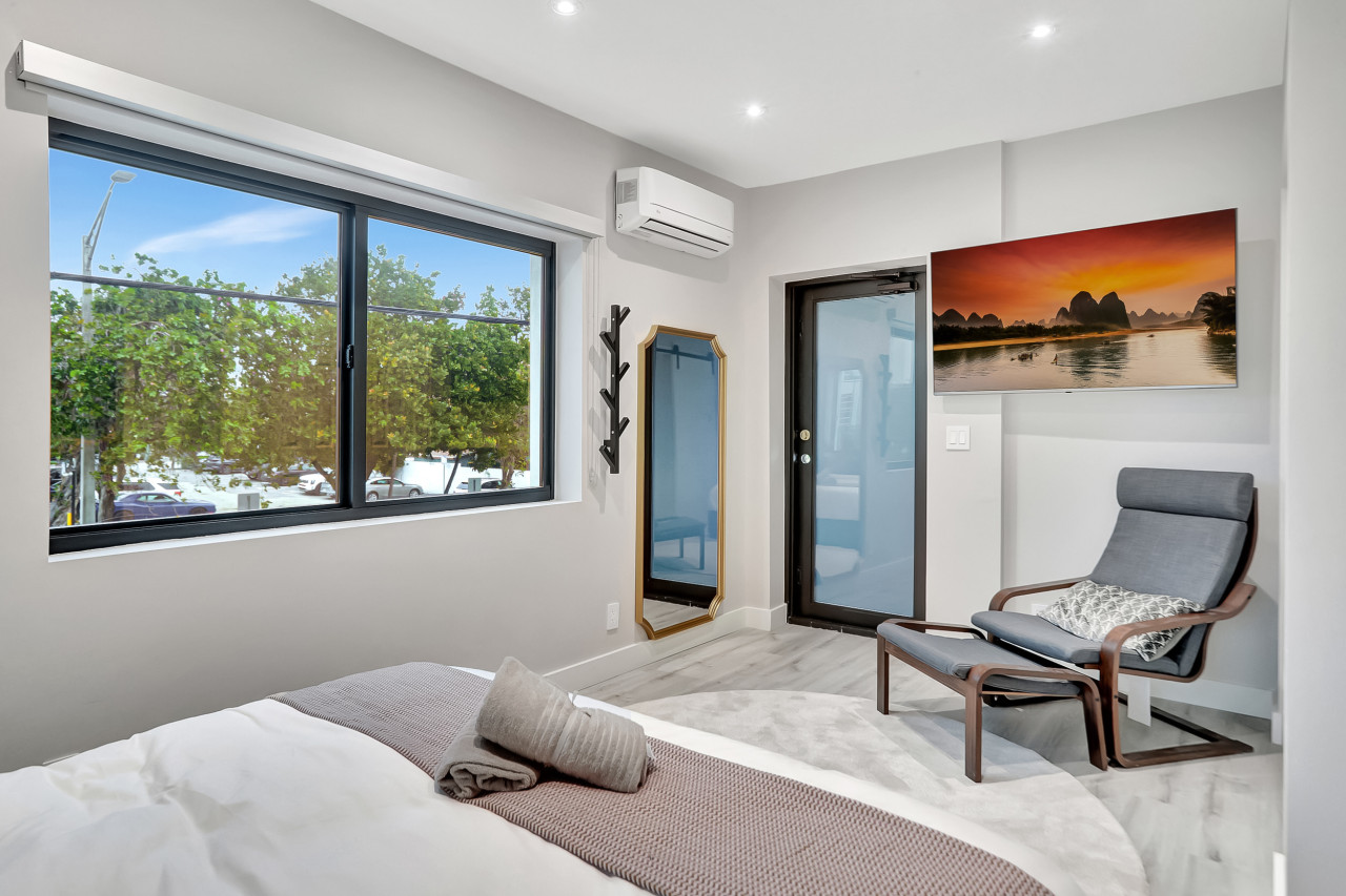 This bedroom is a testament to the power of good design, creating a calming and stylish space.