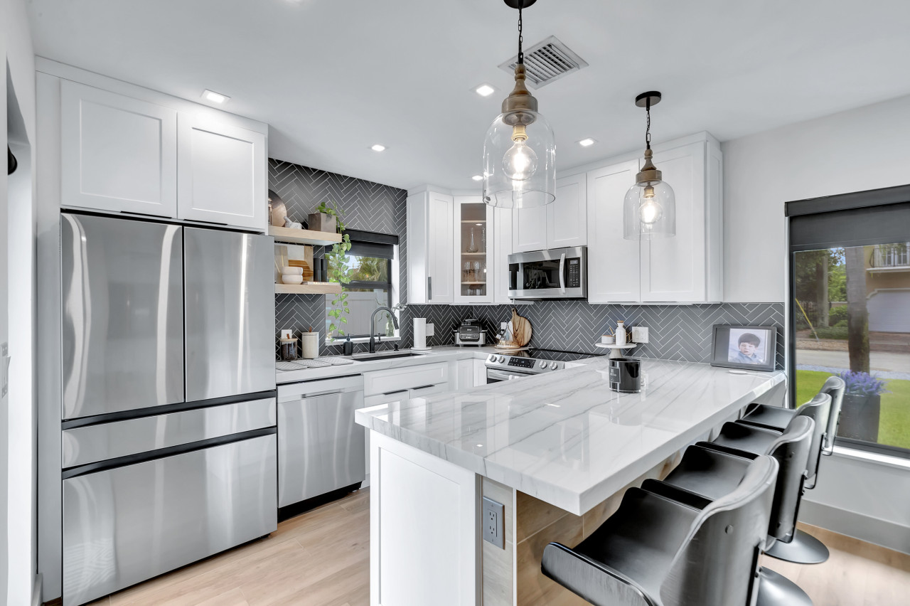 Unit 2’s fully equipped kitchen offers everything you need to whip up delicious meals.