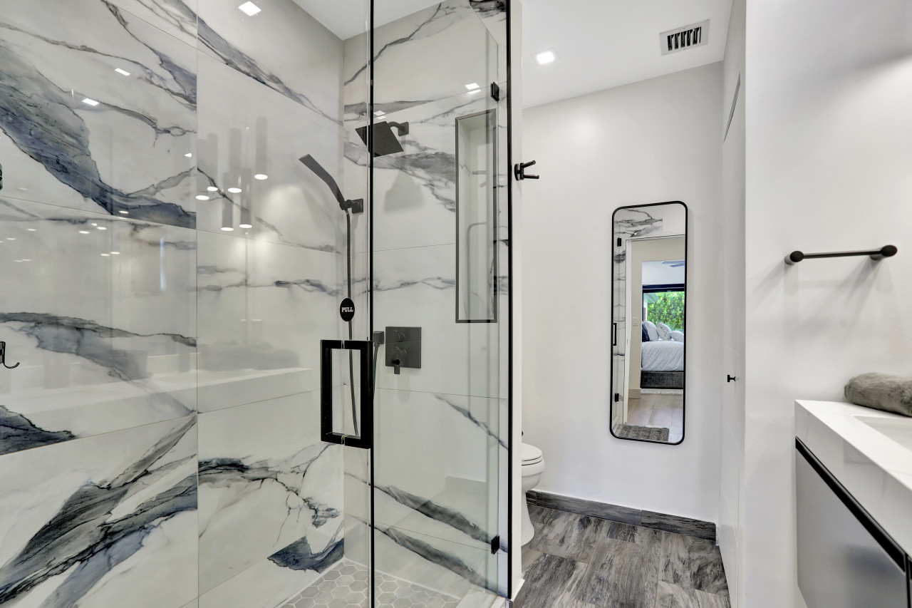 "Unit 2, Bathroom 1 offers a stylish shower, perfect for your daily routine.