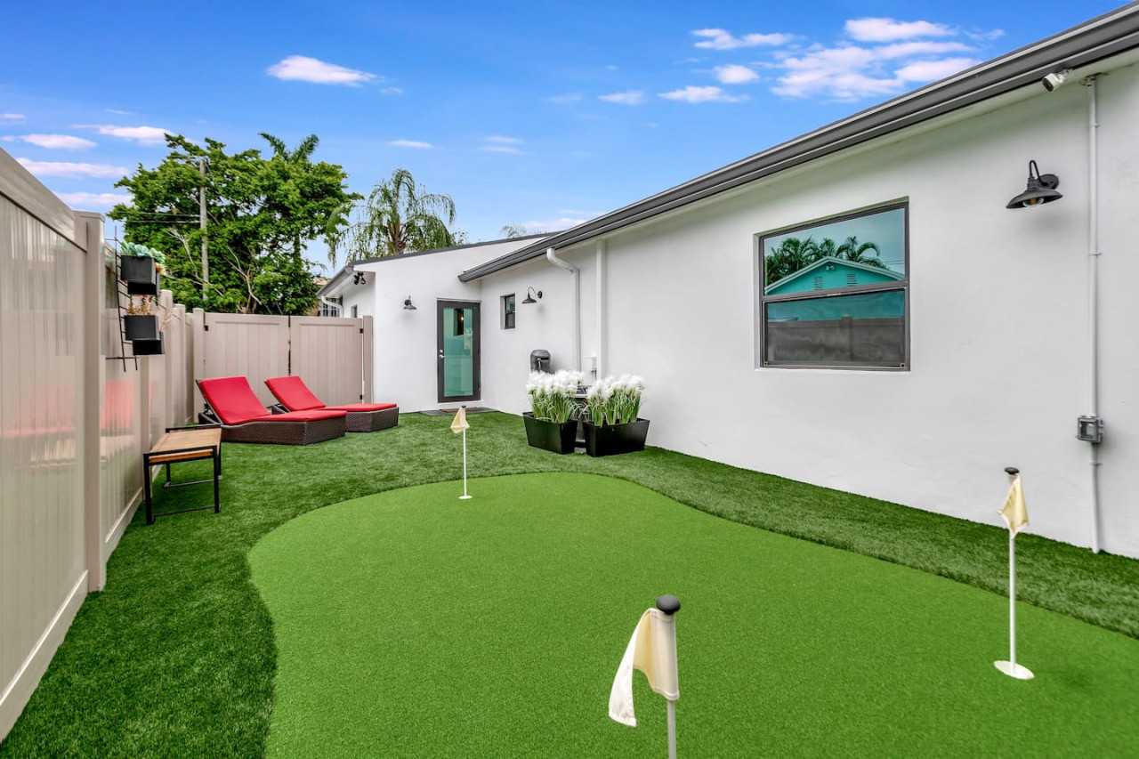 Fun-filled backyard with a mini golf course for family and friends!