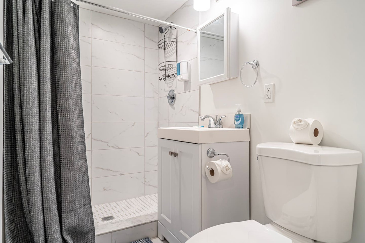 Crisp and clean, this bathroom is ready for a fresh start.