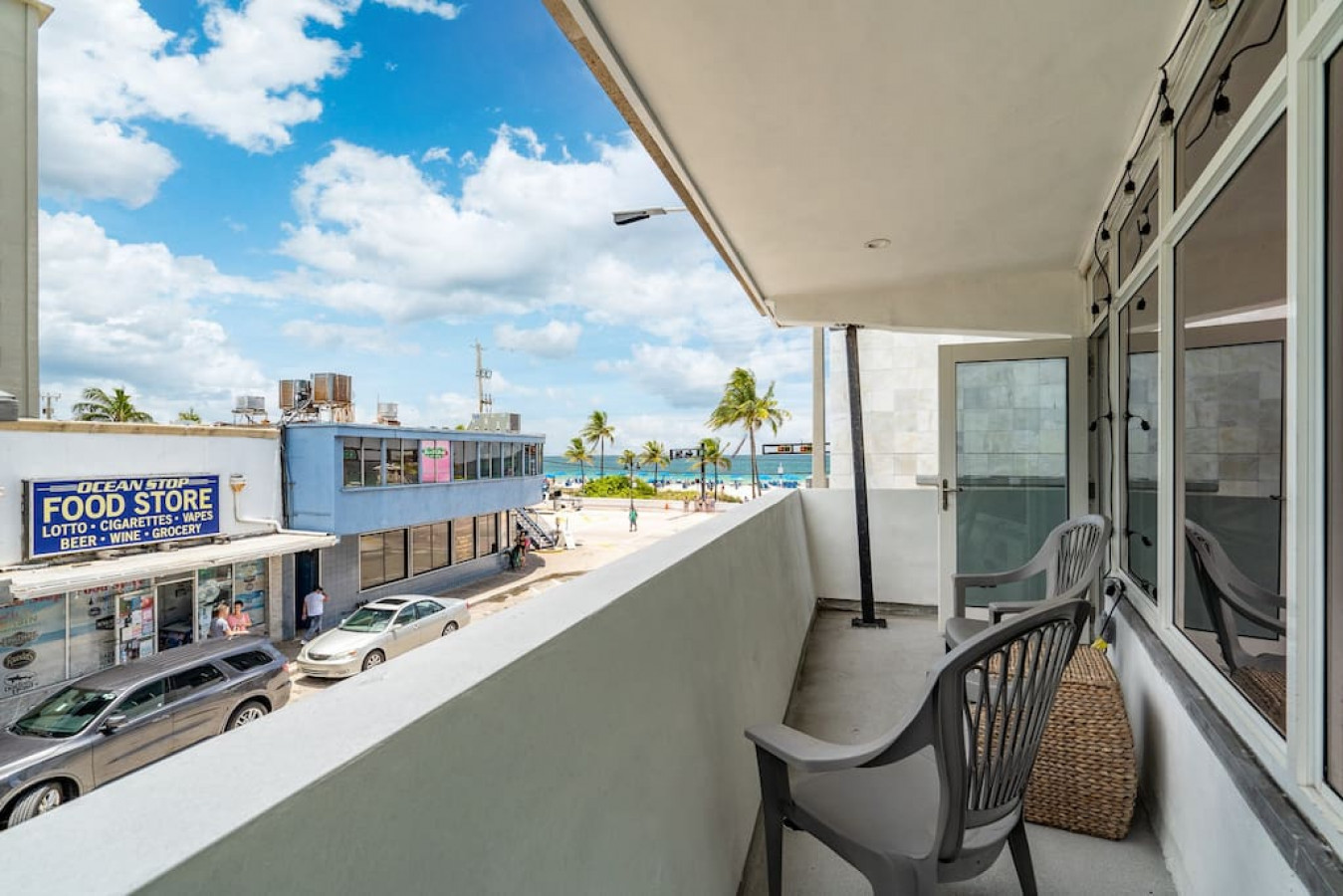 Mornings on this balcony are the perfect way to start the day: listening to the waves, breathing in the sea air, and planning your next meal.