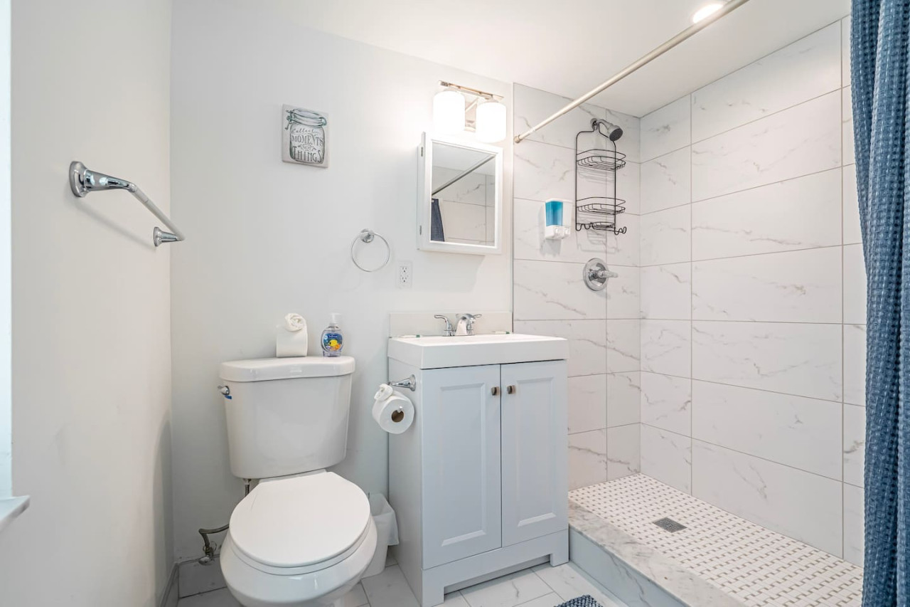 Crisp and clean, this bathroom is ready for a fresh start.
