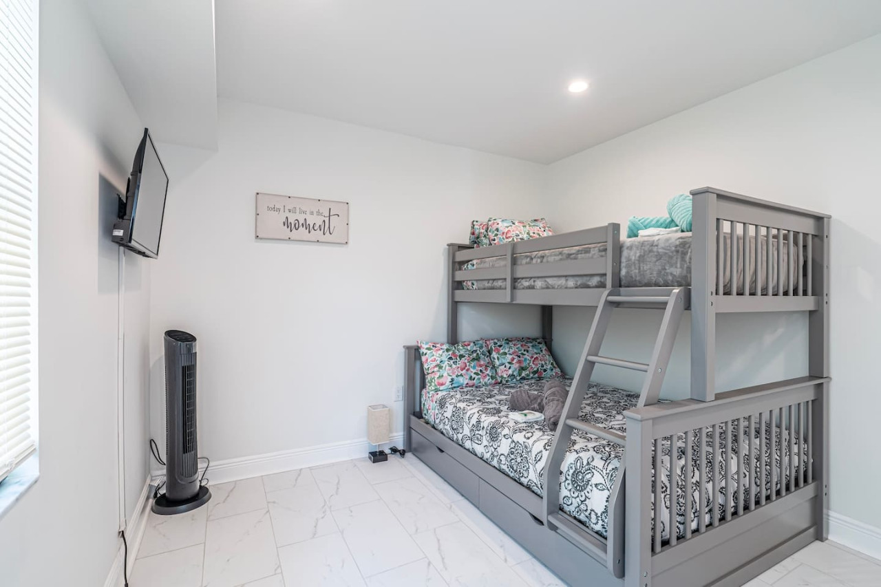 This bedroom is a bunk bed haven, perfect for sleepovers or family vacations.