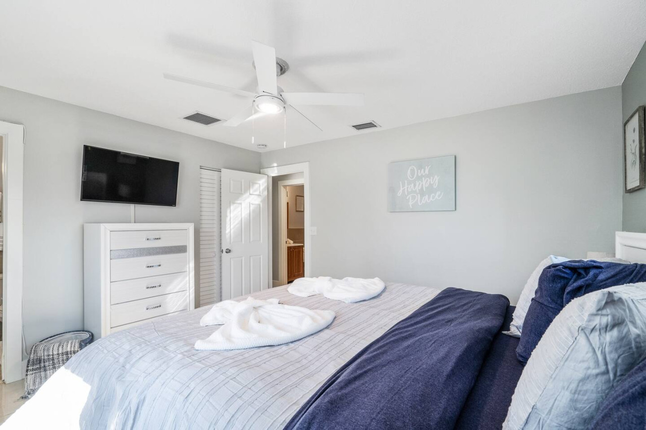 Soft hues and natural light create a calming atmosphere in this serene bedroom.