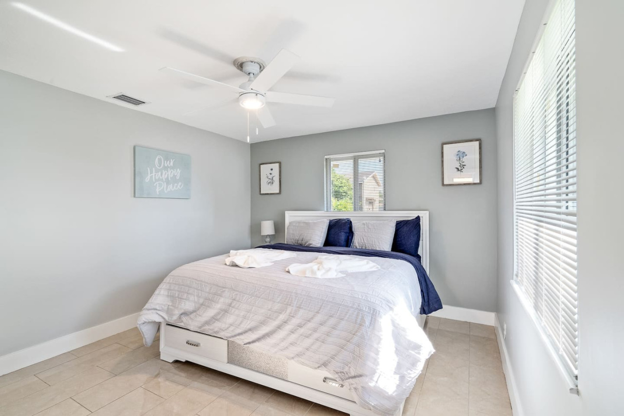 Luxe slumber awaits in this velvet haven bathed in soft morning light.