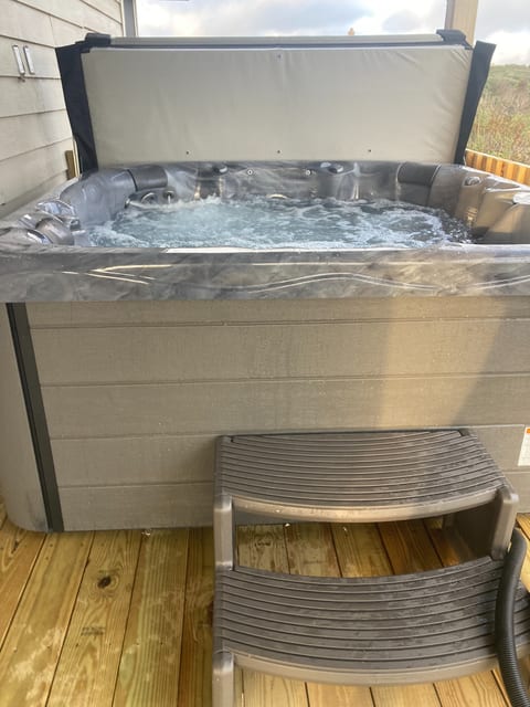 Brand new hot tub on second level. You can enjoy the ocean views while soaking!