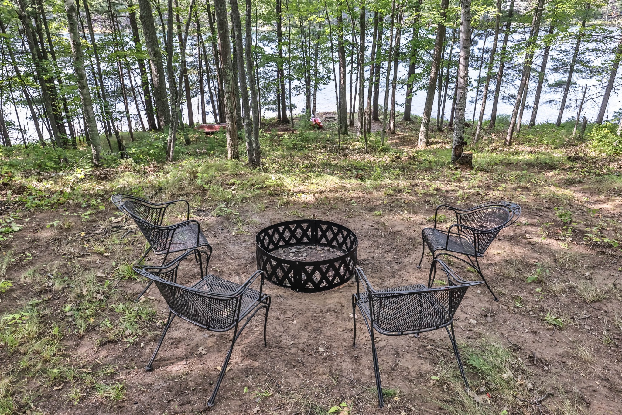 Upper fire pit area overlooking lake  - Family & Dog Friendly Private Year Round Lakefront - Arbor Vitae