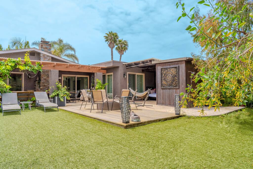 spacious-beach-residence-w-backyard-pond-and-hot-tub/