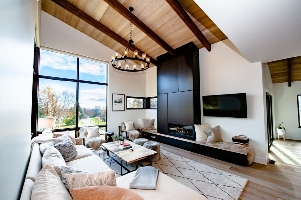 Fabulous floor to ceiling windows grace the living room