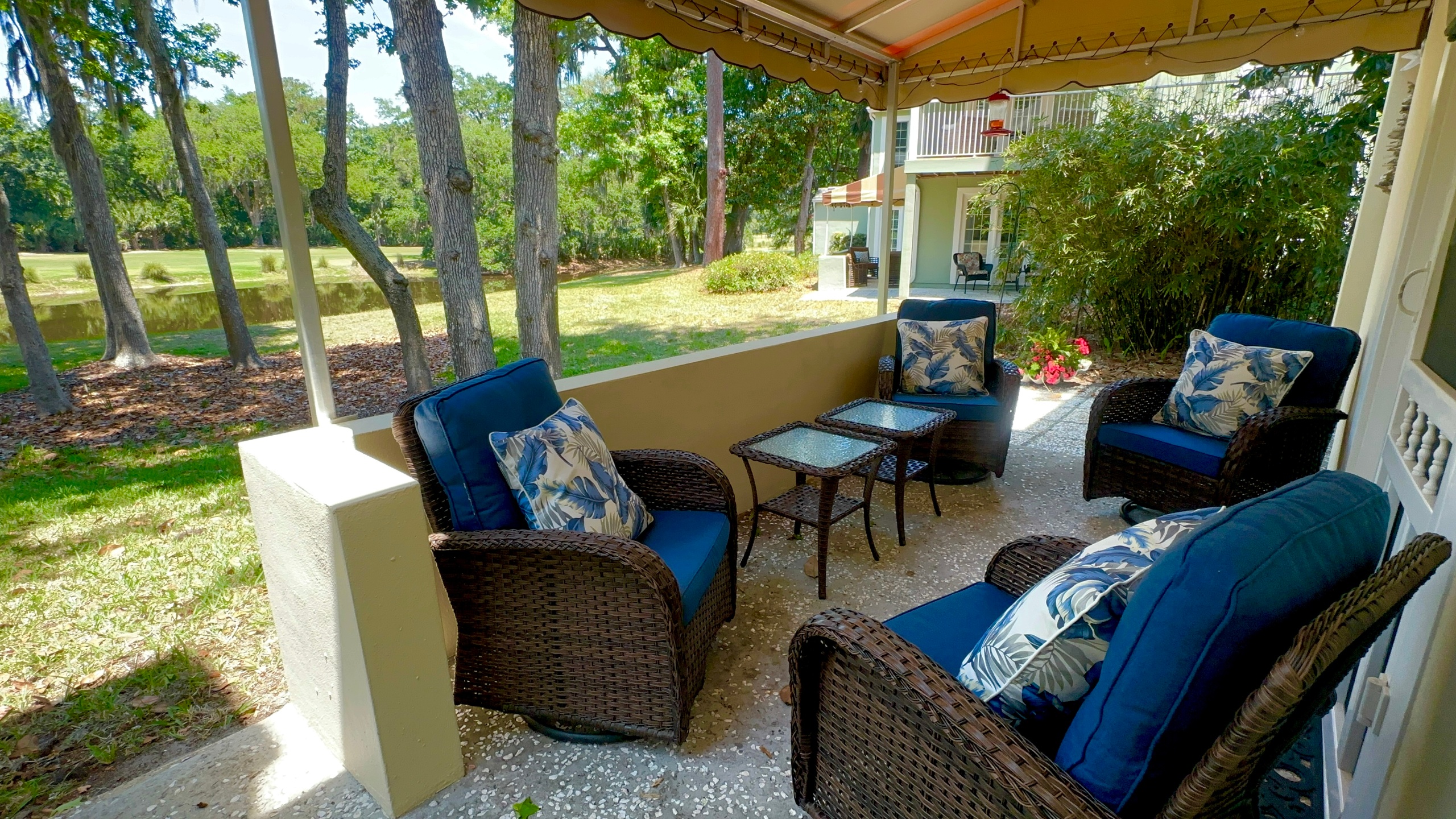 1 of 2 covered patios!  Watch for alligators, deer, cranes & golfers!