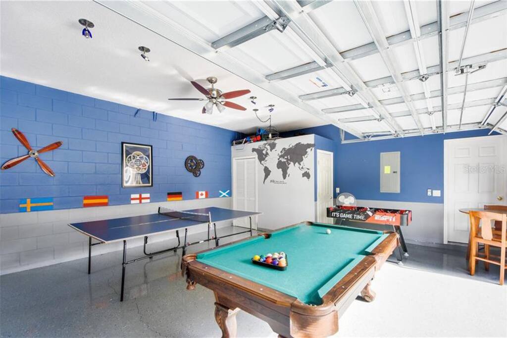 The games room is a great space for everyone to gather around and show off their gaming skills! Also contains a pub style table and chairs. The games room is a great space for everyone to gather around and show off their gaming skills! Also contains a pub style table and chairs. - PREMIUM 5 Bed, 4 Bath Villa w/Pool, Near Disney - Davenport
