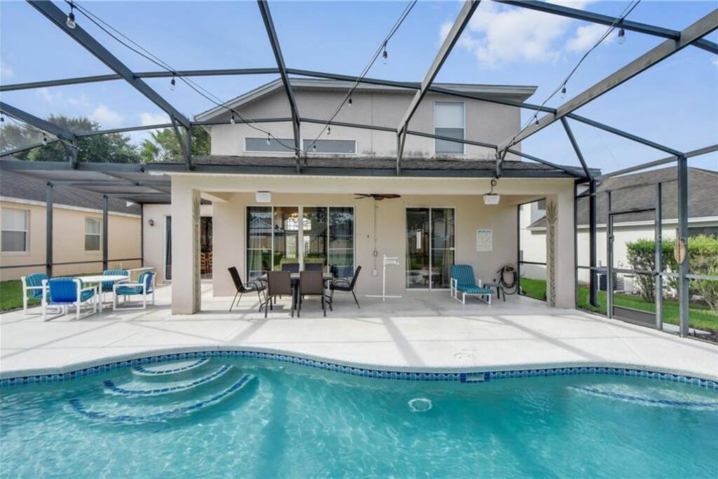 With this home, we offer one of the largest pool decks anywhere on Calabay Parc as well as a large sparkling 15'x30' private screened swimming pool ready to cool you down after a long hot sunny day ou With this home, we offer one of the largest pool decks anywhere on Calabay Parc as well as a large sparkling 15'x30' private screened swimming pool ready to cool you down after a long hot sunny day ou - PREMIUM 5 Bed, 4 Bath Villa w/Pool, Near Disney - Davenport