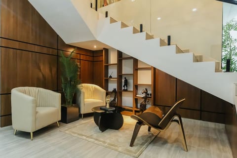 This modern interior area offers a perfect retreat, blending exclusivity, style, and luxurious living.