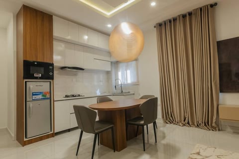 This dining area exudes modern elegance, offering stylish charm and exclusive luxury.