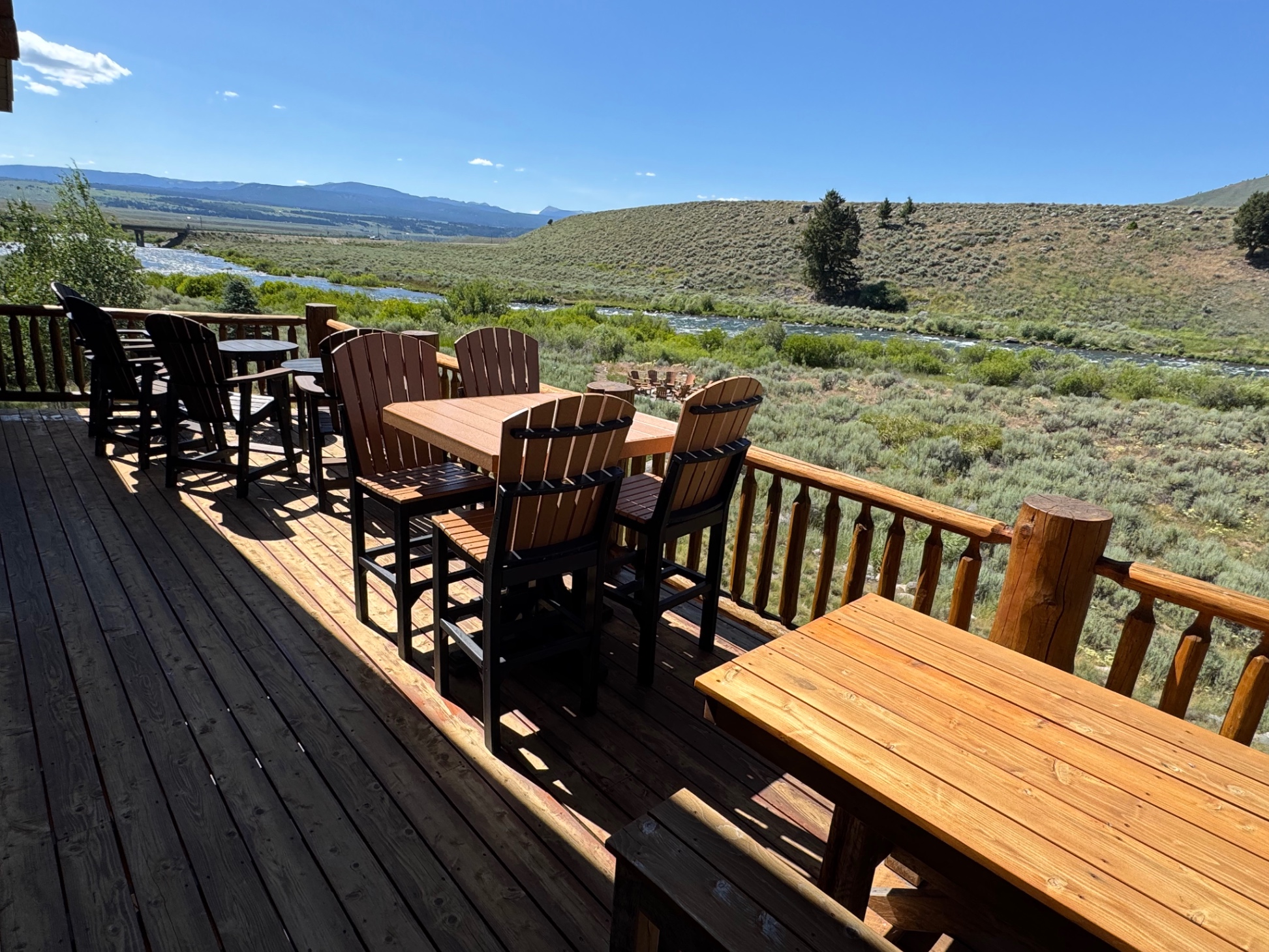 Lots of seating on the rear deck. Fire pit in view below. 