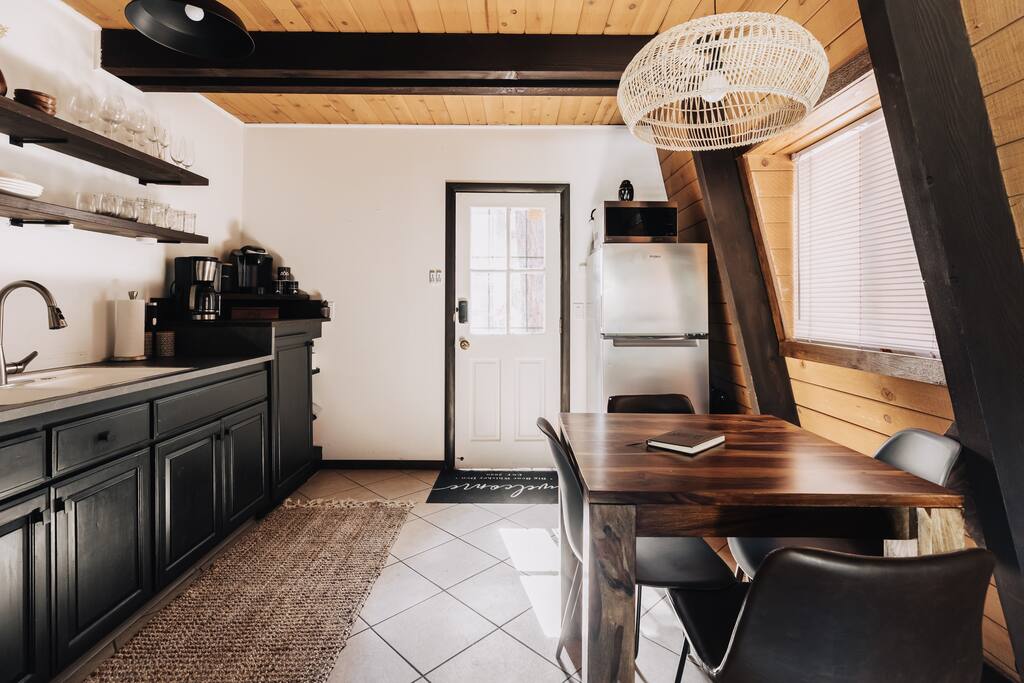 Easy access to the backyard and propane BBQ. Your cabin entry is through the back side of our property directly through this kitchen door. 