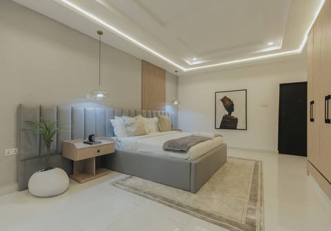 Indulge in affordable sophistication in this cozy bedroom with plush interiors and soft vibes.