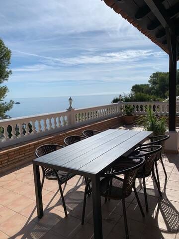 Outdoor dining table with sea view