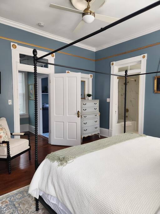 Primary bedroom showing access the full en-suite bathroom