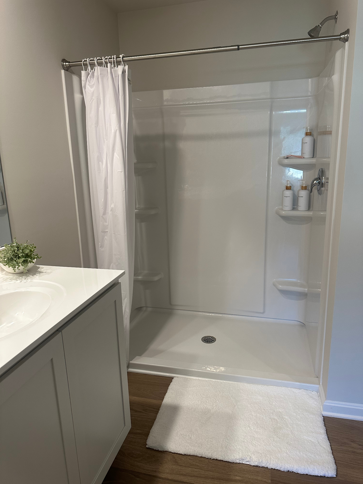 Master bedroom ensuite with walk-in shower and dual vanity Master bedroom ensuite with walk-in shower and dual vanity - Our Shorebird Way - Millsboro