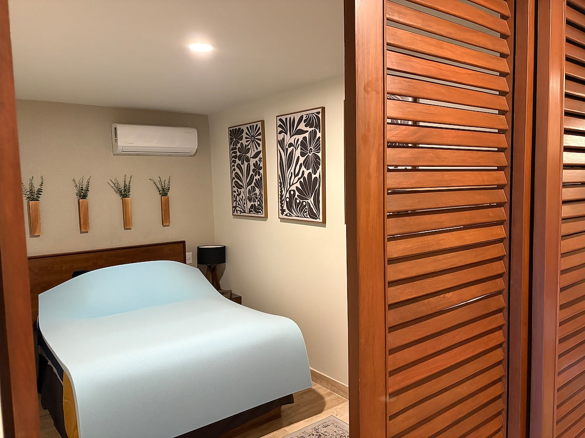 Cultural Touches with Warm Interior Charm Step into a cozy space featuring local art, wood accents, and thoughtful design—perfect for a relaxing stay.