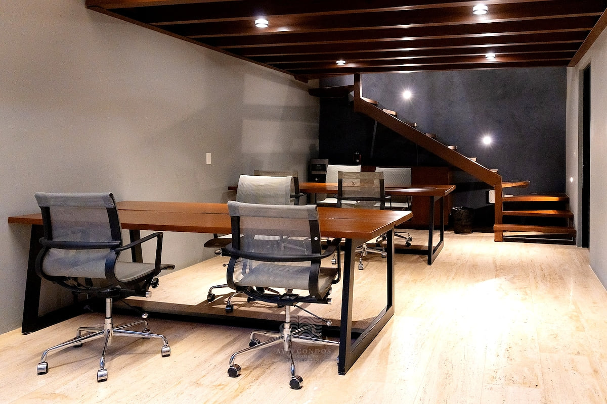 Dedicated coworking space with desks, comfortable seating, and fast Wi-Fi, ideal for remote work and longer stays at AWA Playacar
