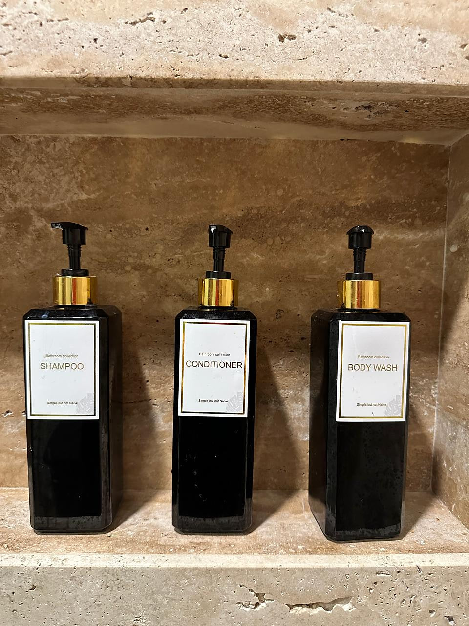 Luxurious toiletries await you in our stylish bathroom. Enjoy complimentary shampoo, conditioner, and body wash, perfect for a relaxing and rejuvenating shower after a long day.