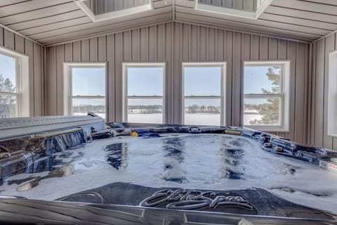 Indoor Hot ub overlooking the river