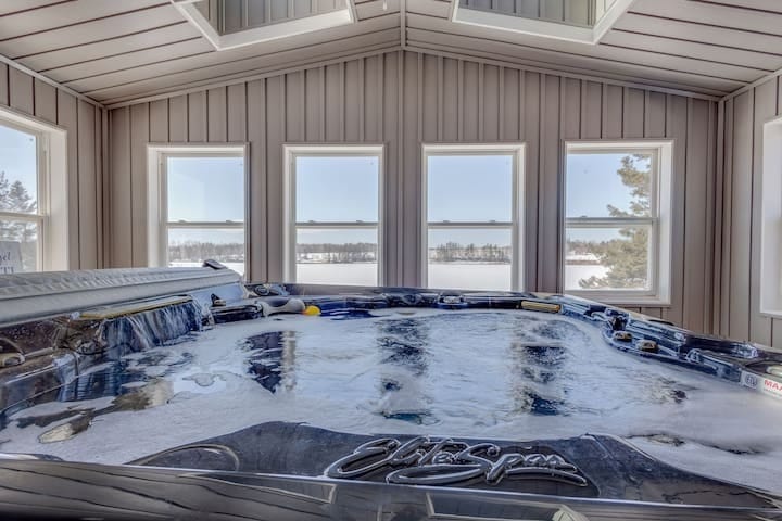 Indoor Hot ub overlooking the river