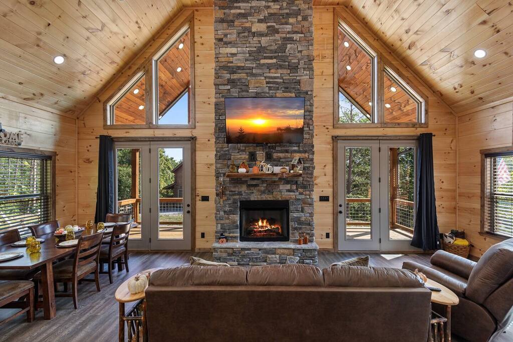 Gorgeous stone fireplace is the focus of the main-level living room. 