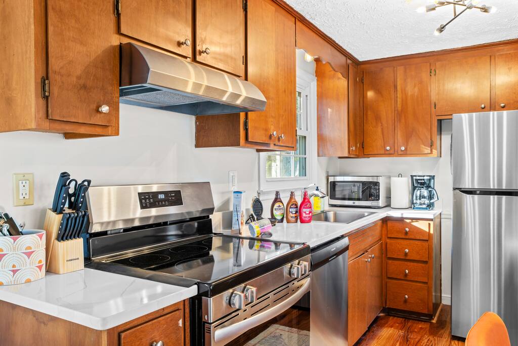 A fully loaded kitchen with essentials such as pots, pans, spices, coffee maker, serveware, waffle maker, rice cooker, coffee maker, pop corn maker, kids cutleries etc. Make your own meals. We also provide waffle syrup & sprinkles. 