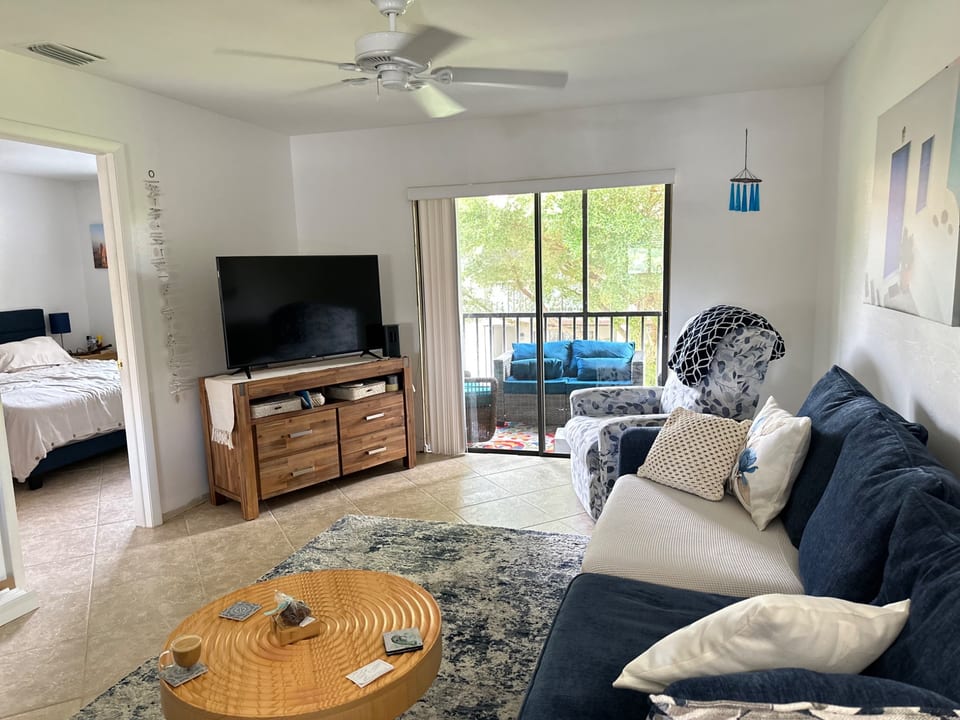 Living room with view of master bedroom (king bed) 