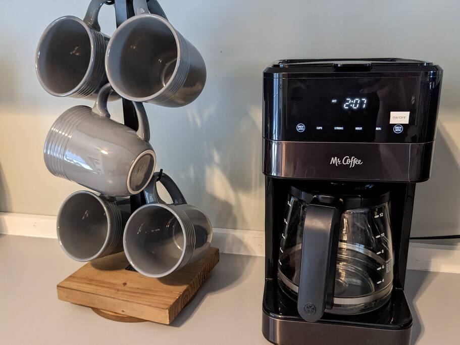 Enjoy the best of both worlds and satisfy all your coffee cravings in one charming space! Double the delight! Behold our kitchen's perfect duo - a classic coffee maker and a K-cup coffee maker. Classic Coffee maker is located in the bottom cabinets Enjoy the best of both worlds and satisfy all your coffee cravings in one charming space! Double the delight! Behold our kitchen's perfect duo - a classic coffee maker and a K-cup coffee maker. Classic Coffee maker is located in the bottom cabinets - N. Chatt Charm - 2 Bedroom - Walk to Walnut St Bridge, Coolidge Park, and the river! - Chattanooga
