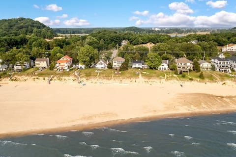 Arial view of the expansive, private beach just steps from the house.