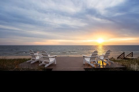 Extended deck off the main deck gets you closer to the beach, lake and amazing views. Enjoy your coffee in the morning and a fire in the SOLO stove smokeless firepit in the evenings.
