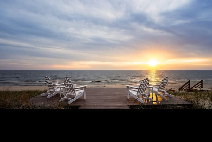 Extended deck off the main deck gets you closer to the beach, lake and amazing views. Enjoy your coffee in the morning and a fire in the SOLO stove smokeless firepit in the evenings.