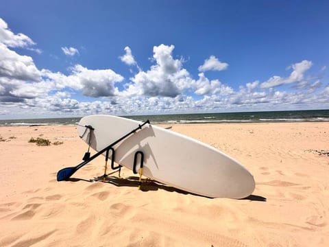 The house is well equipped with tons of beach toys for our guests enjoyment!  paddle boards, games, kids toys, and more!