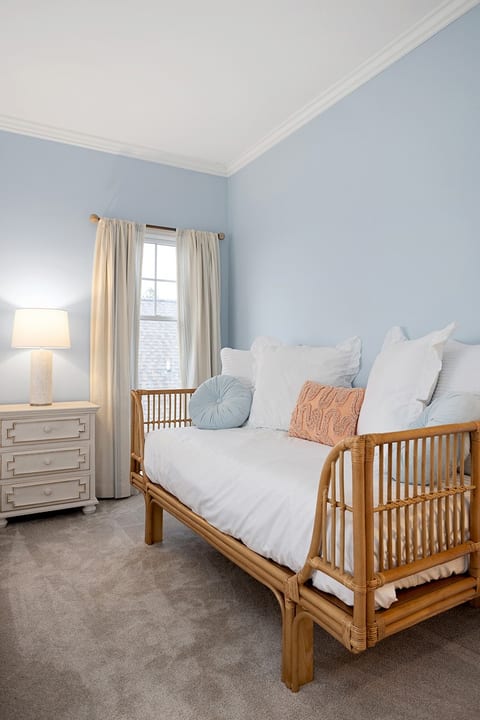 The primary suite has a twin daybed for extra sleep space or lounging.