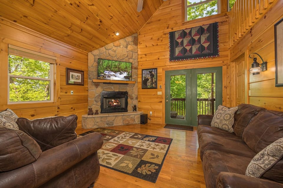 Enjoy a cozy evening in front of the gas fireplace watching a movie on the 55” smart tv
