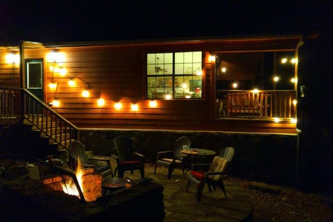 Nighttime ambiance with outdoor lighting, creating a warm and inviting atmosphere for evening gatherings