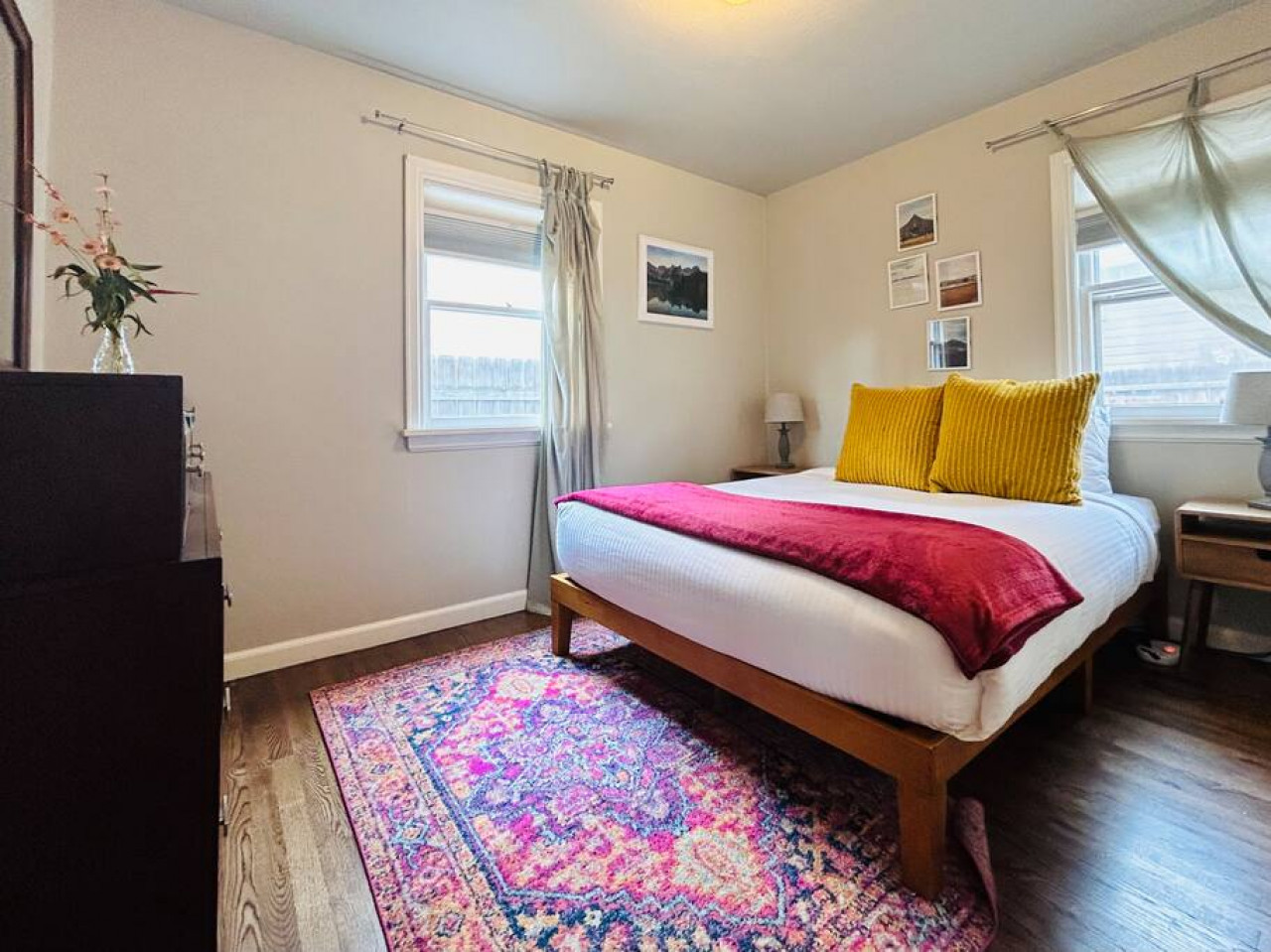 Queen size bedroom with windows