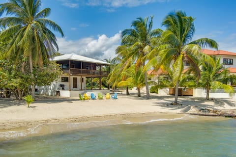 a beachfront home kissin' the Caribbean