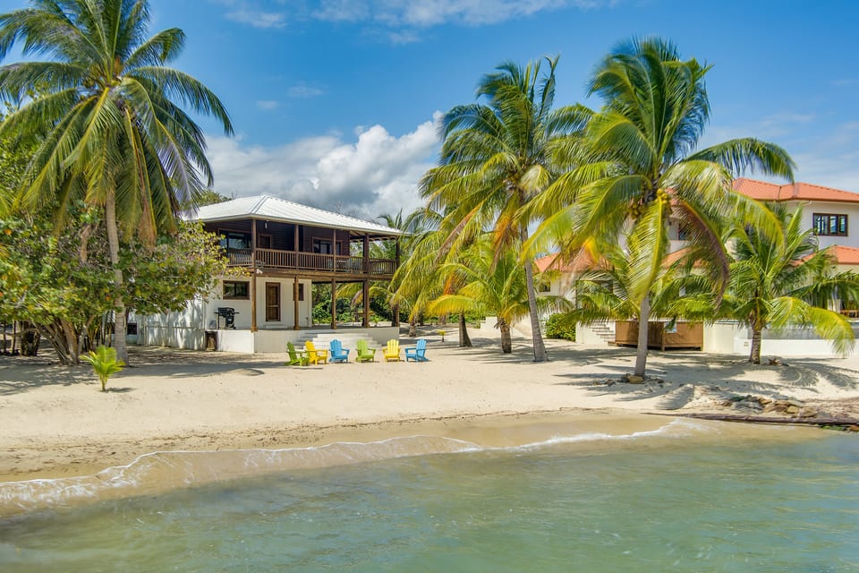 a beachfront home kissin' the Caribbean